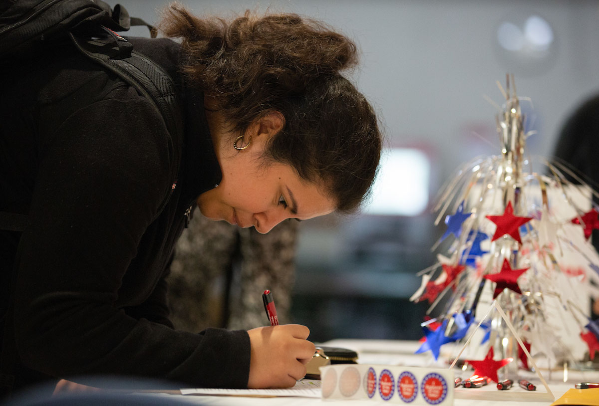 Student registering to vote at the Arts and Sciences Hall