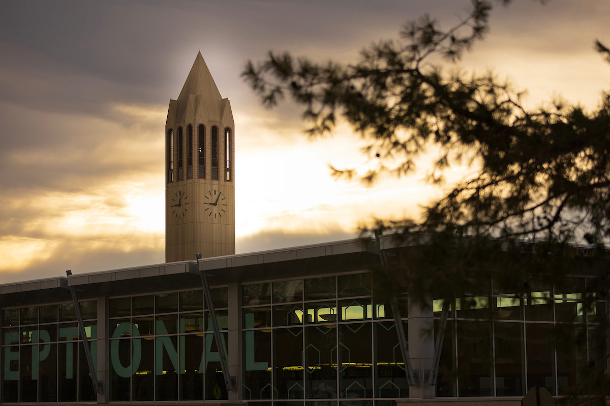 The sun sets behind Criss Library at UNO. Photo: Ryan Soderlin, Office of Strategic Marketing and Communications.