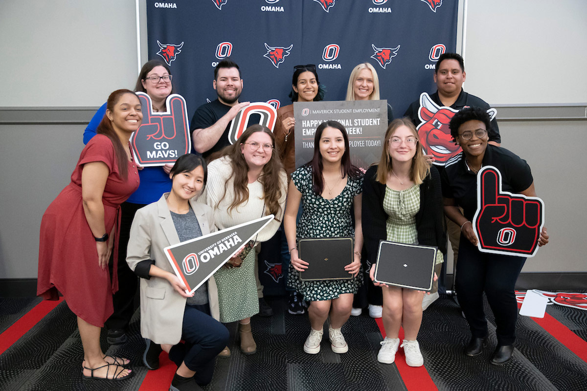 Students pose together to celebrate the Student Employment Awards in 2024.
