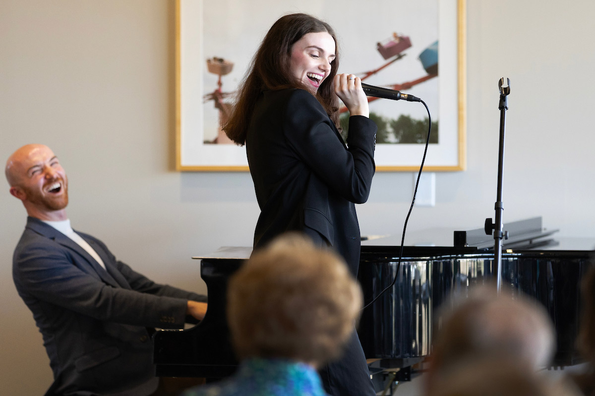 UNO Assistant Professor of Musical Theatre Curtis Reynolds’ Singing Techniques for Actors students sing at the Aksarben Village Senior Center as part of a service learning project.