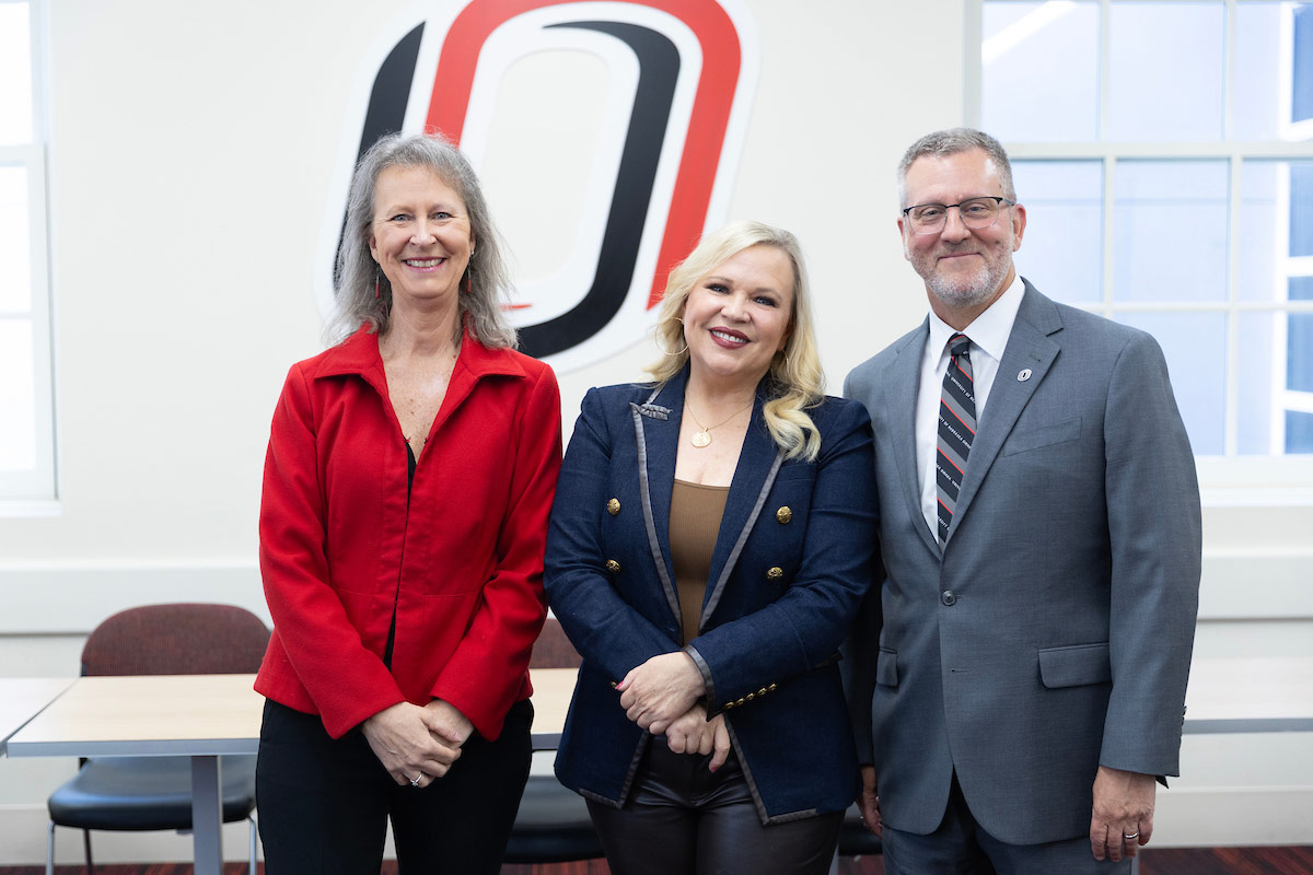 ESPN's Holly Rowe with CFAM School of Communication Director Heather Hundley, left, and CFAM Dean Mike Hilt, right.