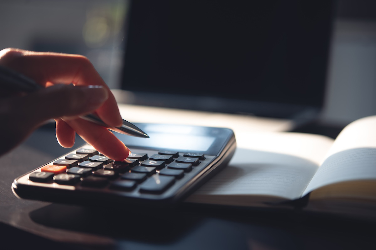 A person using a calculator.