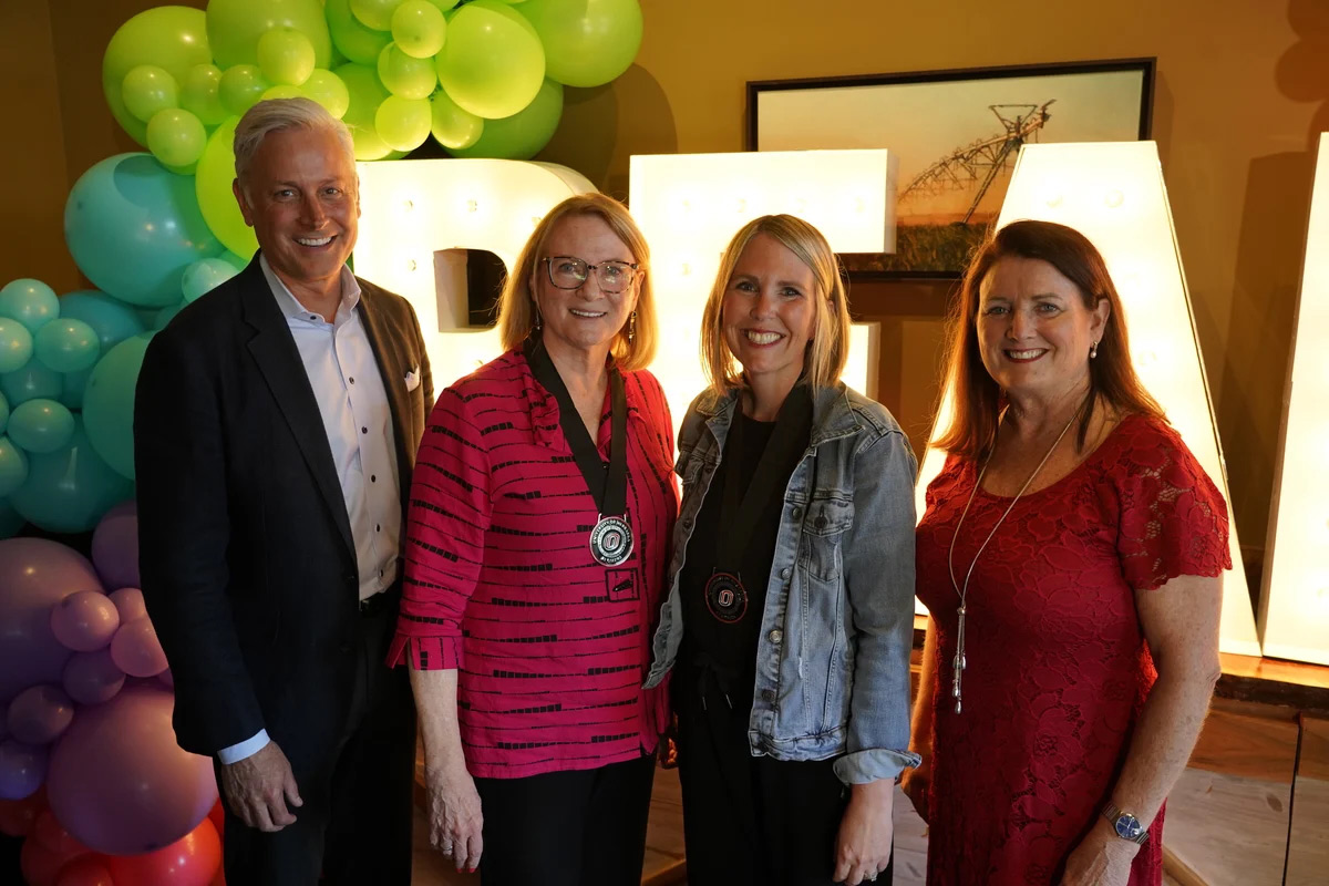 Jennifer Lemke, Ph.D., assistant professor of literacy at UNO, third from left, is pictured with Lozier Foundation representatives, Tre Brashear, Dianne Lozier and Susan Toohey.