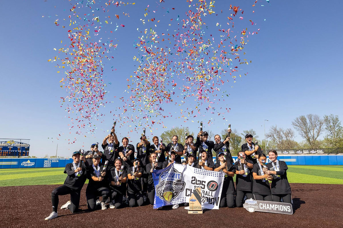 Omaha Softball players celebrate winning the title.