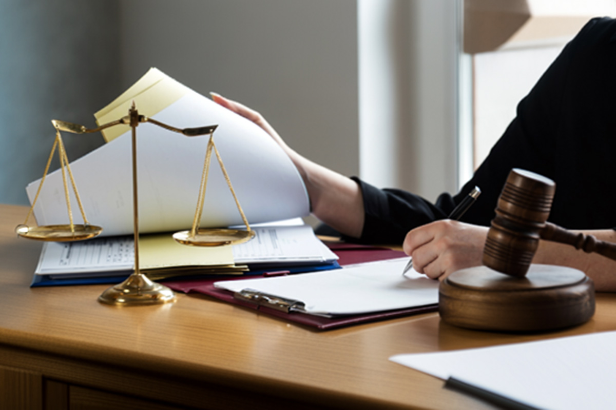 Judge gavel with scales of justice.