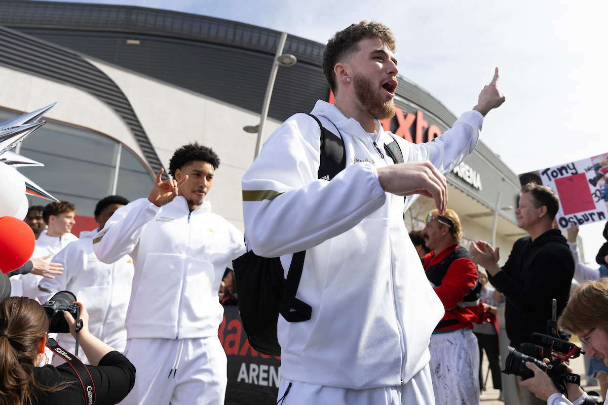 University of Nebraska at Omaha fans cheer on the UNO men’s basketball team as they load the bus as they make their way to the NCAA basketball tournament on Tuesday, March 18, 2025, at Baxter Arena. Photo: Ryan Soderlin, Office of Strategic Marketing and Communications.