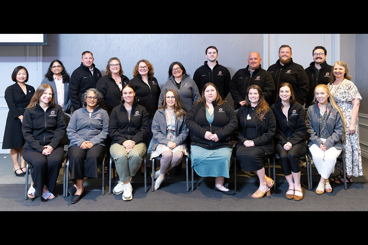 Chancellor’s Leadership Academy graduates pose for a photo.