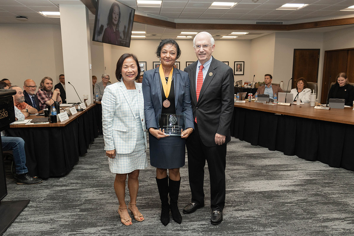 Sajda Qureshi, Ph.D. with UNO administration and NU President Gold.