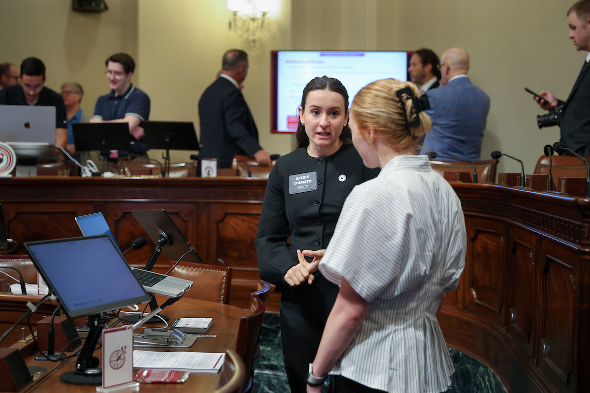 University of Nebraska at Omaha students and researchers with NCITE traveled to Washington D.C. to present research on jailbroken and obliterated AI models to U.S. House of Representatives members. Student Alexis d’Amato is seen here on Tuesday, September 1, 2026, speaking with a congressional staffer. (UNO/Marlo Larsen)