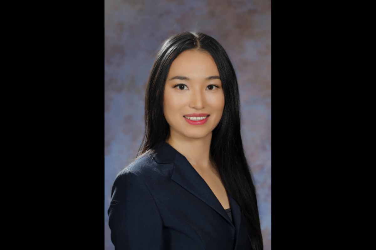 Vertical headshot of Jane Liu on a black background
