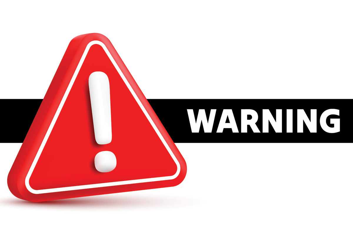 Red warning sign and black banner with white text that says "warning"