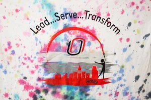 Lead, serve, and transform are written in three words on top, with the UNO log in the center and a city view of Omaha, Nebraska, at the bottom.