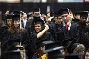 graduates moving tassel over