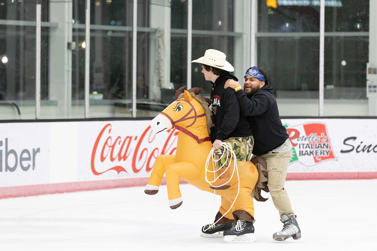 Students skating at Baxter Arena