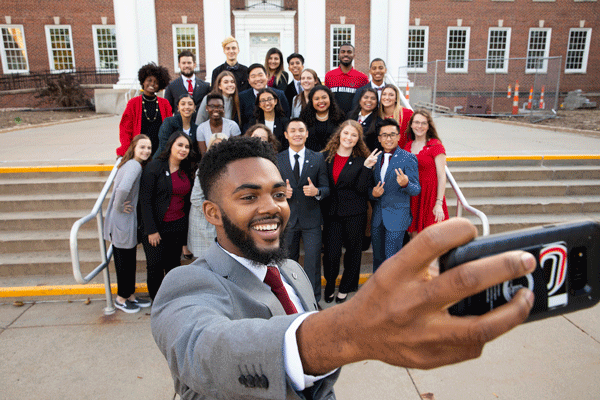 Vice President, Jabin Moore, takes a selfie with Freshman Leadership Commission 